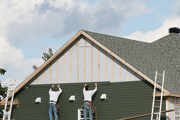 Professional Siding Installation technician working in Lexington, MA